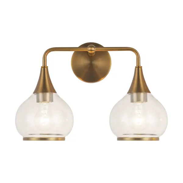 The Hazel vanity light brings early-1900s apothecary elegance to modern bathrooms with flowing clear glass shades and aged gold accents. Its 17-inch width makes it ideal for smaller vanities while delivering classic style.