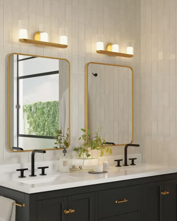 The Birch vanity light delivers romantic candlelight ambiance through clear glass cylinders with frosted diffusers. Integrated LED technology provides warm 3000K lighting in a brushed gold finish that complements contemporary and transitional bathrooms. - alternate view