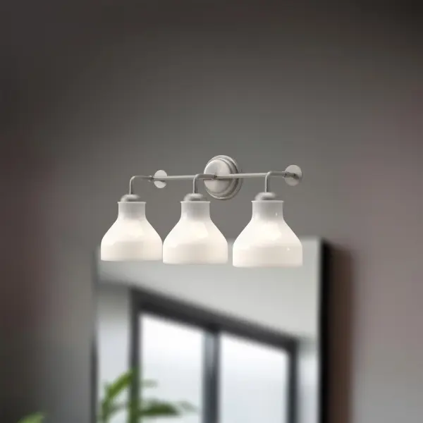 The Westlake vanity light brings 1920s Parisian cafe charm to your bathroom with vintage milk jug-shaped opal glass and clean metal lines. Its warm ambient glow and versatile mounting options make it perfect for various spaces. - alternate view