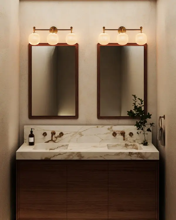 The Cherise vanity light brings 1920s candy shop nostalgia to life with bonbon-shaped ribbed opal glass shades. Its matte black finish and Art Deco styling create a sophisticated focal point while providing soft, flattering illumination. - alternate view