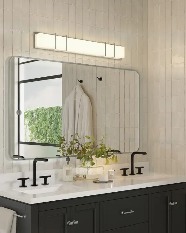 The Alberni vanity light combines modern geometric design with practical functionality. Its 38-inch width and up/down lighting make it ideal for larger bathroom vanities, while the integrated 3000K LED provides warm, flattering illumination. - alternate view