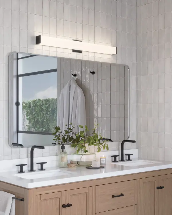 The Jane vanity light combines minimalist design with practical functionality. Its 36-inch extruded square diffuser provides even, warm LED illumination while the innovative sliding lamp assembly allows precise positioning during installation. - alternate view