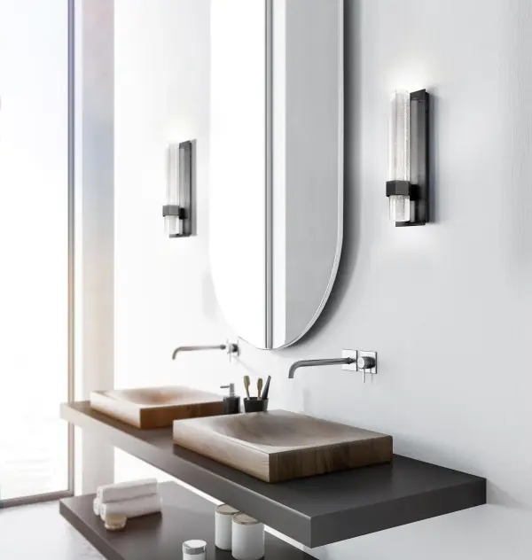 The Warwick 15" wall sconce features striking hexagonal crystal elements with bubble details that create captivating light patterns. Integrated LED technology provides warm, even illumination perfect for bathrooms and hallways. - alternate view