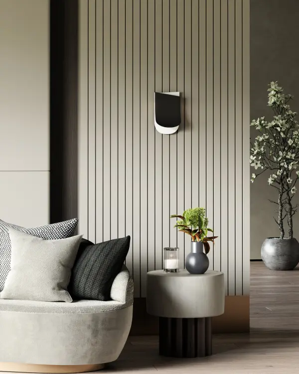 The Sonder wall sconce combines artistic design with practical lighting through its asymmetric dual-shade configuration. The bold black and white duo-tone finish creates visual interest while the integrated LED provides warm ambient downlight. - alternate view