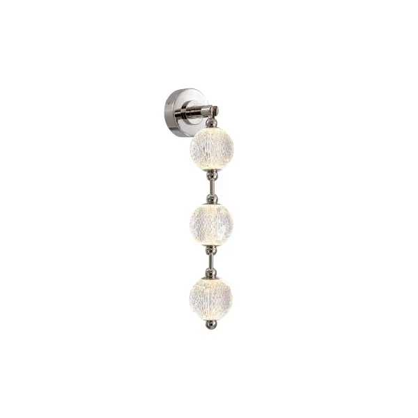 The Marni 23-inch vanity light features meticulously cut spherical glass shades that create stunning beams of light, adding luxury and visual interest to bathrooms and beyond. Integrated LED with warm 3000K lighting.