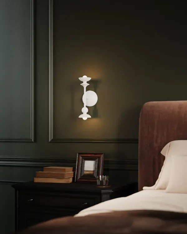 The Cadence vanity light brings abstract sculptural design to everyday spaces with its asymmetrical yet balanced organic shapes. The textural Antique White finish adds warmth and sophistication to bathrooms and powder rooms. - alternate view