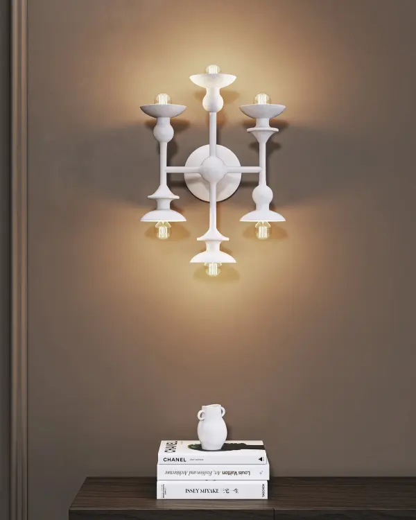 The Cadence vanity light brings abstract sculptural design to everyday spaces with its asymmetrical yet balanced organic shapes. The textural Antique White finish adds warmth and sophistication to bathrooms and powder rooms. - alternate view