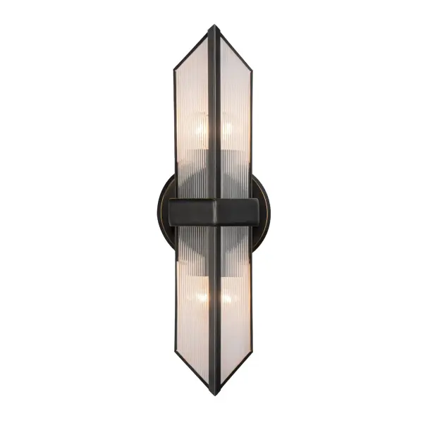 The Cairo vanity light brings architectural sophistication to bathroom and hallway spaces with its pyramid-inspired design and ribbed glass panels. The Urban Bronze finish paired with textured glass creates visual interest while providing functional illumination.