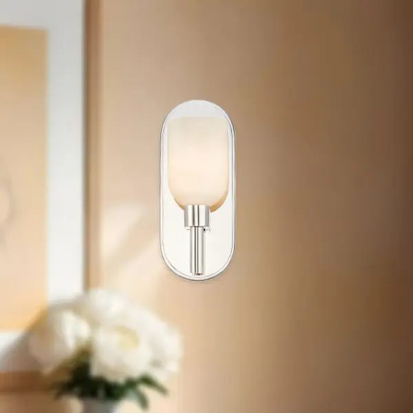 The Lucian collection is inspired by the classic shapes of antique lighting, made modern. Modern touches can be seen in the organically curved backplates and custom designed stems that create the stunning look of the Lucian. Completed with either clear glass or alabaster bowl shades, this collection defines classic elegance. *Alabaster boasts distinct variations in both its veining and tone, a unique characteristic of a timeless natural material. No two pieces will look the exact same. 60W E12 or equivalent bulb required, not included Designed for bathroom, powder room, entryway, hallway, and beyond Transitional Style with Decorative Details Installation hardware included Easy assembly instructions included in box Can be mounted up or down - alternate view