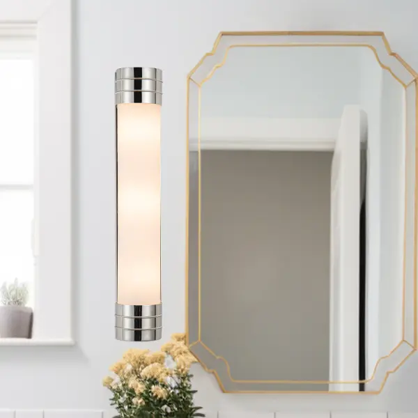 The Willard collection brings timeless elegance with its strong metal framework and prismatic glass accents. Perfect for bathrooms and hallways, this 24-inch fixture offers versatile transitional styling. - alternate view