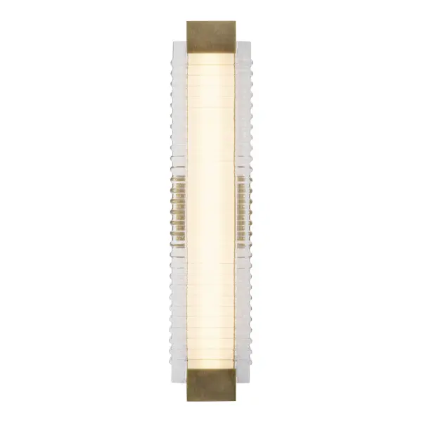 The Alai vanity light brings coastal sophistication to any space with its distinctive ribbed glass design that mimics gentle ocean waves. Featuring energy-efficient integrated LED lighting at 2700K, this 25-inch fixture delivers warm, inviting illumination perfect for bathrooms and hallways. - alternate view