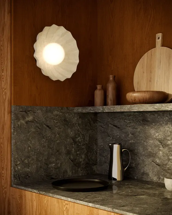 The Soleil sconce combines retro sunburst styling with contemporary LED efficiency. Its distinctive opal glass shade creates a striking focal point while providing adjustable color temperature for versatile ambiance control. - alternate view