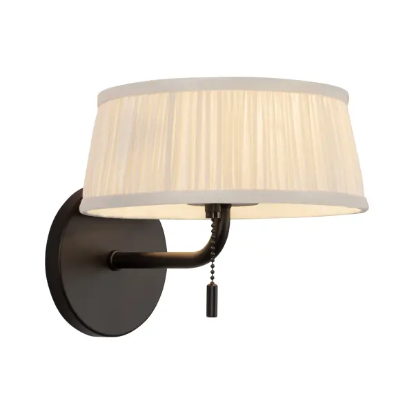 The Scout Wall Sconce combines whimsical metalwork with a patterned pleated linen shade for character-filled lighting. Features a convenient pulley switch ideal for bedside use, delivering soft ambient illumination.