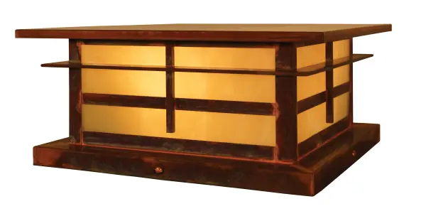 The Finsbury column mount combines artisanal metalwork with warm cream glass for a sophisticated outdoor lighting solution. Its raw copper finish develops a natural patina over time, adding character to entryways and porches.