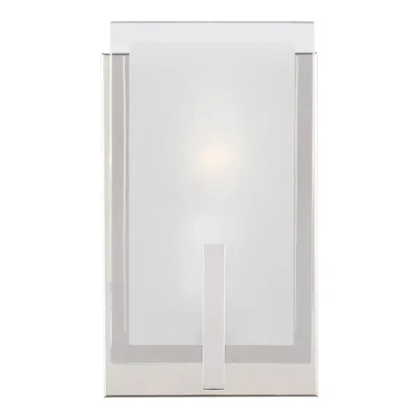The Syll wall sconce delivers clean, contemporary style with practical shadow-free illumination. Its compact 5-inch width and frosted beveled glass make it ideal for powder rooms and vanities where space is limited.