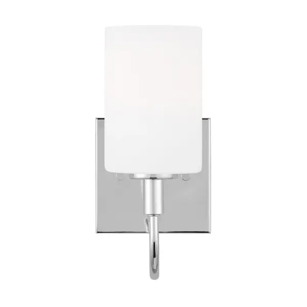 The Oak Moore vanity light offers flexible installation with up or down mounting options and a clean transitional design. Its etched white glass shade provides soft, even illumination ideal for bathroom tasks.