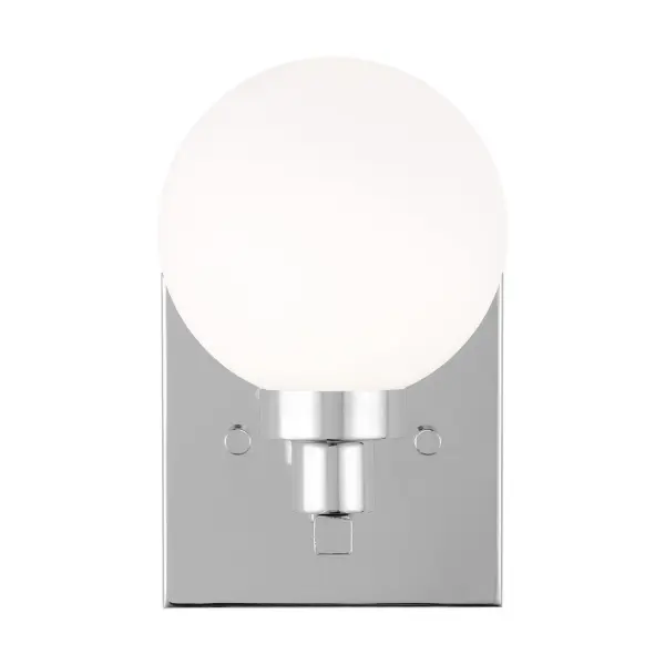 The Clybourn bath vanity blends industrial edge with minimalist restraint, featuring a chrome finish and milk glass shade. Its compact 5-inch width makes it ideal for tight spaces while delivering focused task lighting.
