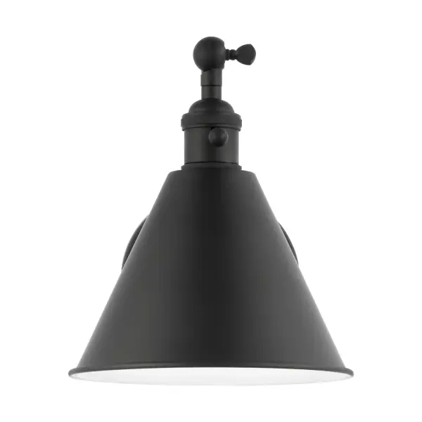 The Salem wall sconce by Chapman & Myers delivers bold contemporary style with its midnight black finish and matching glass shade. At 13.38" tall with a 17.5" extension, it provides focused task lighting ideal for vanities and hallways.