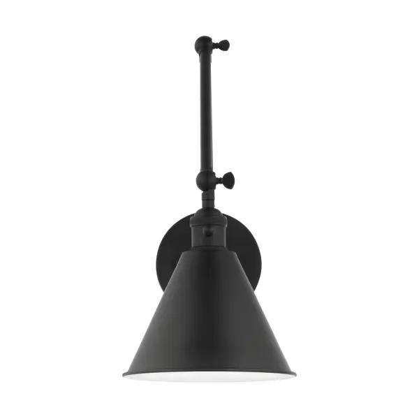 The Salem wall sconce combines contemporary design with practical efficiency. Its compact 7-inch width and midnight black finish make it ideal for modern bathrooms and hallways where space is at a premium.