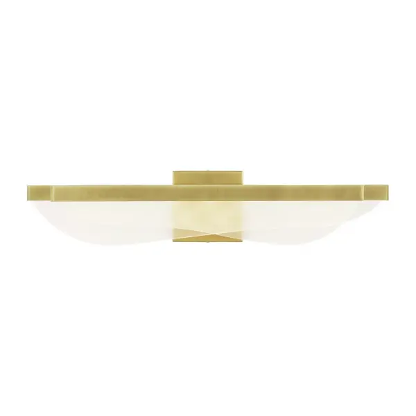 The Nyra Bath Bar transforms functional bathroom lighting into a sculptural statement piece. Designed by Sean Lavin, its layered acrylic panels with light guide technology deliver exceptional illumination while creating visual drama.