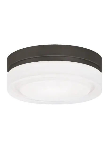The Cirque by Sean Lavin delivers clean contemporary styling in a compact 6-inch profile. Its pressed glass shade with hand-polished exterior and die-cast metal frame creates an understated yet refined look perfect for tight spaces.