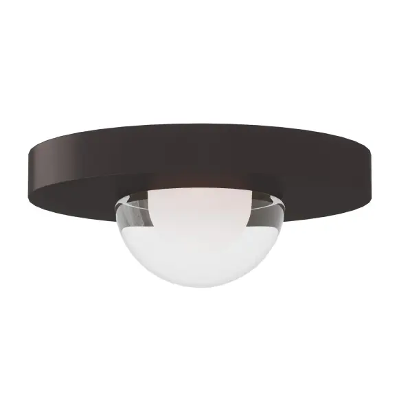 Kelly Wearstler's Ebell reimagines the flush mount with a multi-dimensional domed crystal prism set into a cylindrical brass body. The integrated warm LED delivers museum-quality light in a compact, ADA-compliant design.