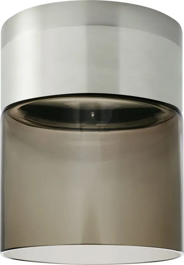 The Manette Small Flush Mount combines refined satin nickel finish with transparent smoke glass for a sophisticated, space-saving lighting solution. LED technology delivers warm 3000K illumination with excellent 90 CRI color rendering.