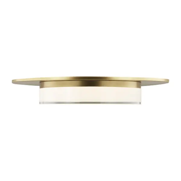 The Sen Flush Mount by Sean Lavin combines contemporary design with efficient LED technology. Its 17-inch pressed glass diffuser and natural brass trim create sophisticated ambient lighting for modern spaces.