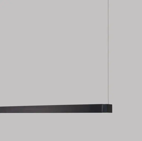 The Dyna GR Linear Chandelier combines modern minimalist aesthetics with functional LED lighting. Its anodized black finish and clean linear form make it versatile for both residential and commercial spaces. - alternate view