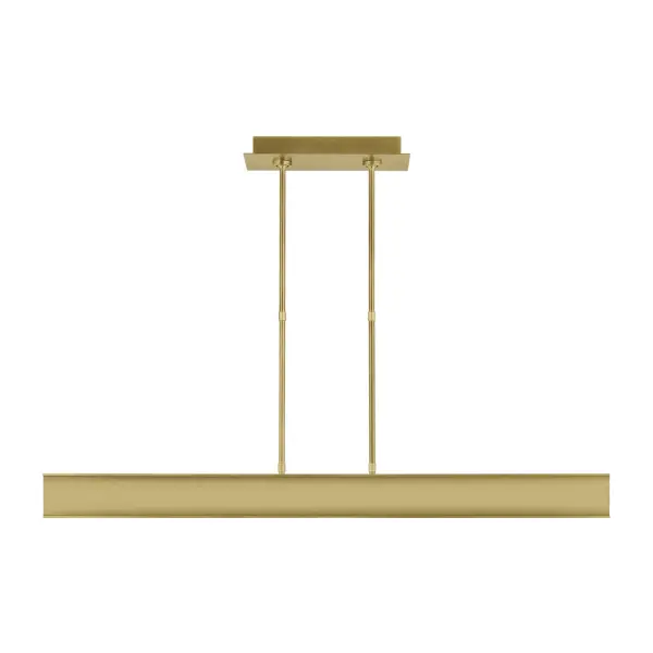The I-Beam by Mick De Giulio delivers minimalist sophistication with its sculptural linear form and directional LED lighting. The plated brass finish adds warmth while the clean lines maintain modern restraint, making it ideal for task-focused spaces.