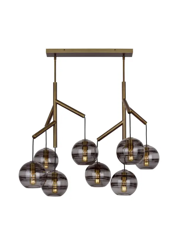 The Sedona chandelier reimagines traditional lighting with eight spherical glass orbs suspended from a sleek central hub via textured cloth cords. Artisan-crafted glass interiors feature dimensional banding that creates visual intrigue while the aged brass finish adds warmth.