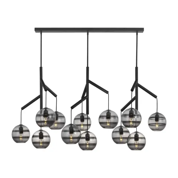 The Sedona 12-light chandelier makes a bold statement with its deconstructed design featuring 12 handcrafted smoke glass orbs suspended from a sleek central hub. The artisan-crafted glass with interior banding creates visual depth and dimension.