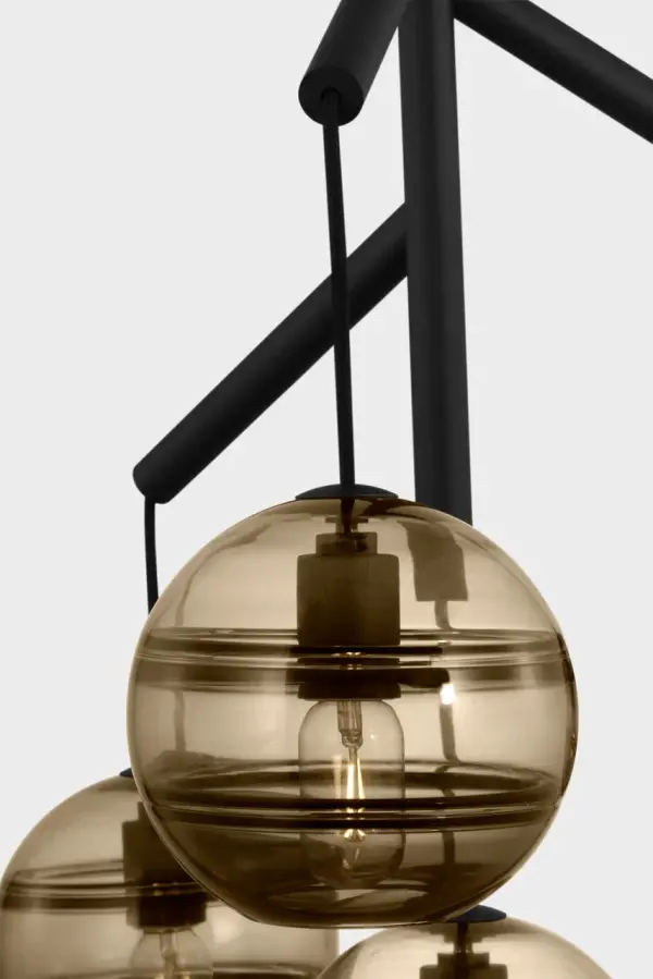 The Sedona chandelier combines contemporary design with artisanal glass craftsmanship. Its transparent smoke glass shade and nightshade black finish create dramatic visual interest while the integrated 2700K LED provides warm, inviting illumination. - alternate view