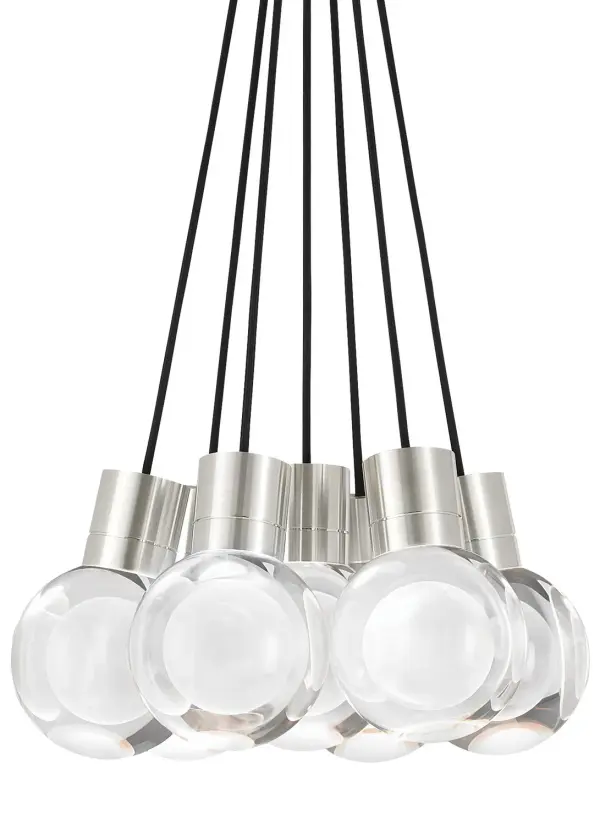 The Mina LED Pendant combines sophisticated design with practical functionality. Its laser-etched crystal sphere creates a stunning visual centerpiece while the integrated 7-light LED system delivers exceptional task lighting below.