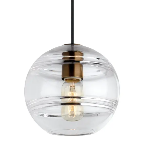 The Sedona pendant combines handcrafted glass artistry with energy-efficient LED technology. Its transparent orb features interior glass bands that create visual depth, while the aged brass finish adds warmth. Perfect for multiples over islands or as accent lighting.
