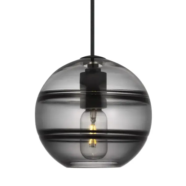 The Sedona pendant combines a sleek spherical exterior with artfully crafted interior glass bands that create captivating visual depth. Its compact 7.5-inch scale makes it ideal for clustering or solo installation in intimate spaces.