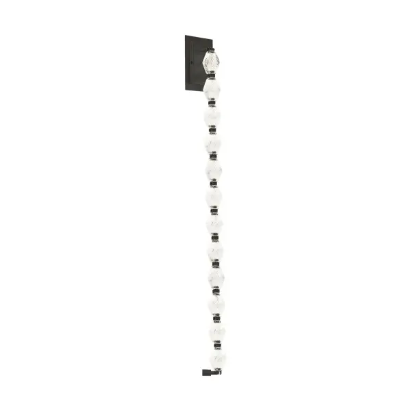 A luxurious 40-inch vertical wall sconce featuring solid faceted Czech crystal and brass connectors. The integrated LED creates dramatic light play through the crystal while the dark bronze finish adds sophistication.