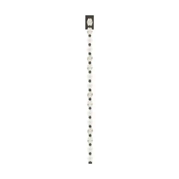 A dramatic vertical statement piece featuring solid faceted Czech crystal and brass connectors. The 53-inch length creates a luxurious light sculpture perfect for grand spaces with high ceilings.