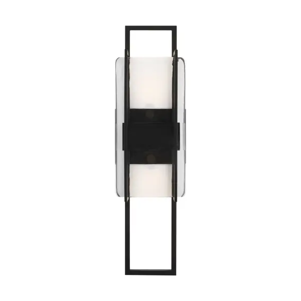 The Duelle wall sconce by Mick De Giulio combines industrial design with refined elegance. Its pressed art glass and concealed LED create beautiful up and down light, adding vertical drama to any space while maintaining ADA compliance.