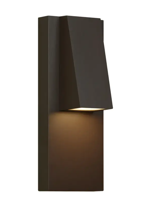 The Peak LED wall lantern brings modern architectural design to outdoor spaces with its distinctive pitched roofline and clean lines. Designed by Sean Lavin, this compact fixture features integrated LED technology and wet-rated durability.