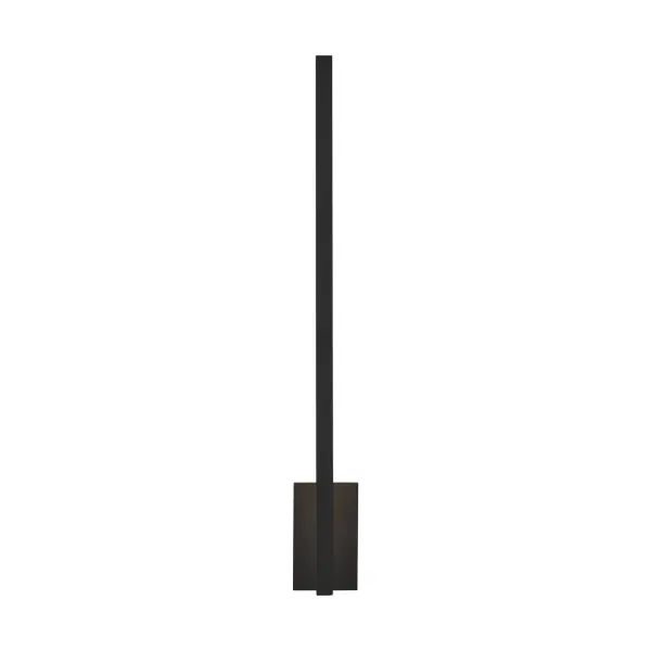 The Stagger LED Wall Sconce by Mick De Giulio delivers sophisticated indirect lighting through a minimalist 25-inch vertical profile. Its concealed LED source and optional flush canopy create a seamless architectural statement.