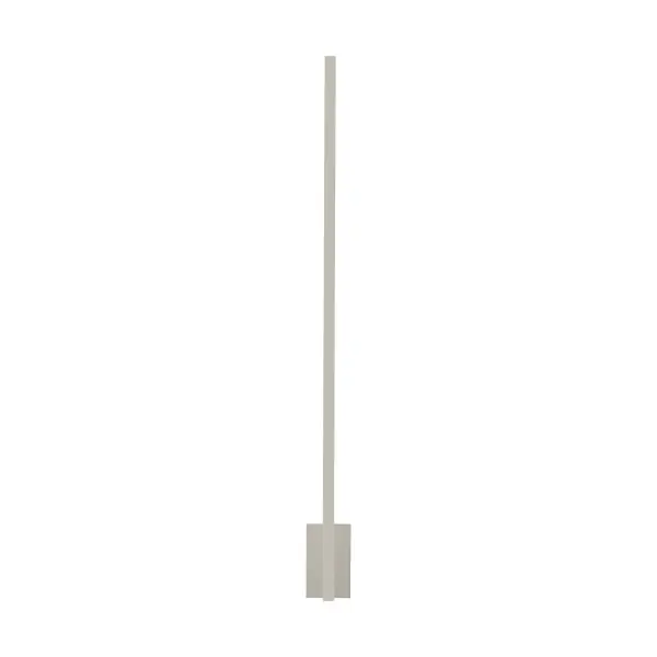 The Stagger LED Wall Sconce by Mick De Giulio delivers sophisticated indirect lighting through a slender 37-inch profile. Its concealed LED source and optional flush canopy create a seamless architectural integration.