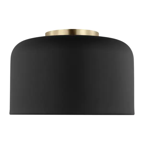The Malone flush mount combines youthful simplicity with refined detail. A midnight black steel shade features a warm satin brass spun-metal disk and socket cover that creates visual interest without overwhelming the clean design.