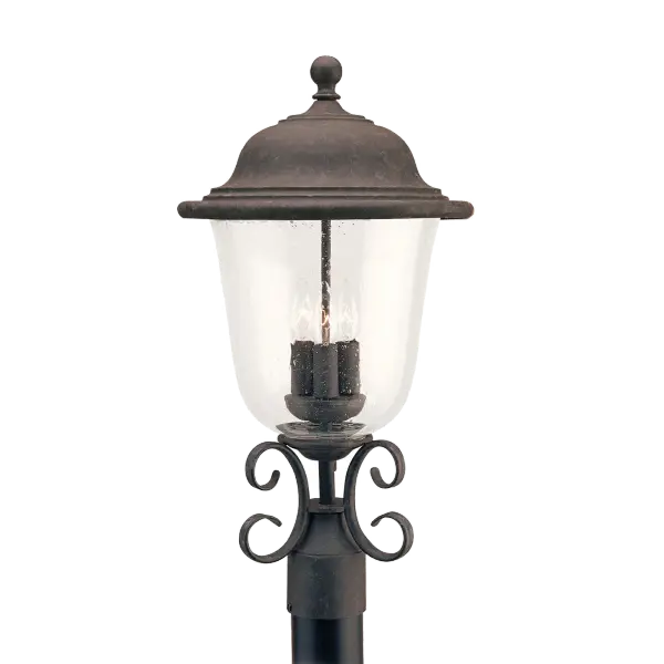 The Trafalgar post lantern brings traditional elegance to outdoor spaces with its oxidized bronze finish and three-light configuration. Perfect for illuminating pathways, driveways, and entryways with classic style.