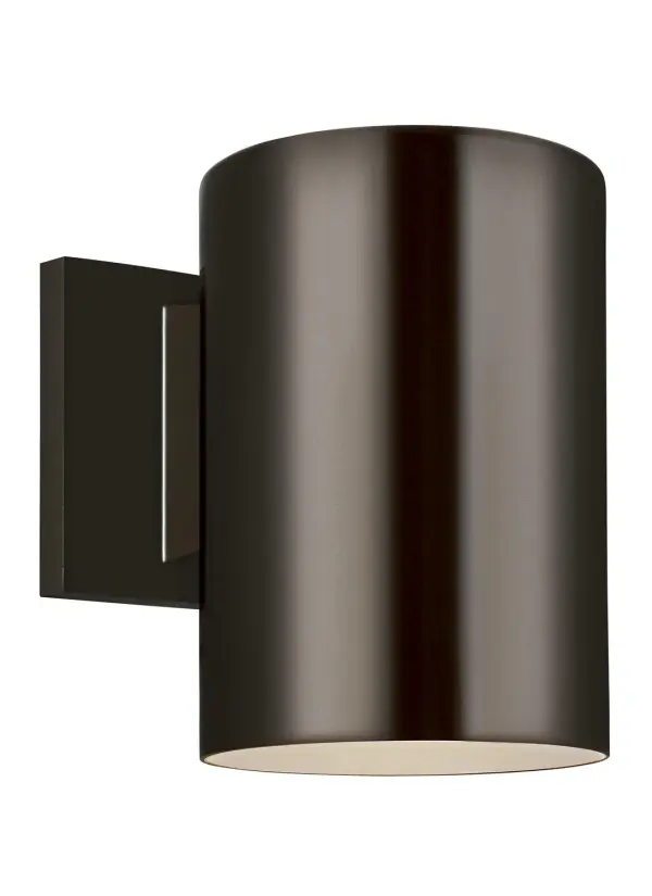 A sleek, wet-rated outdoor wall lantern with integrated LED technology. The cylindrical aluminum design in bronze finish delivers focused downlight ideal for entryways and patios. Energy-efficient with 25,000-hour lamp life.