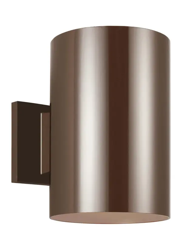 A sleek, cylindrical outdoor wall lantern that delivers focused downlight in a compact footprint. The wet-rated aluminum construction and bronze finish provide durability and style for contemporary exteriors.