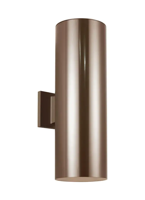 A modern cylindrical design that delivers functional outdoor lighting with clean architectural lines. The bronze finish and tempered glass construction provide durability and weather resistance for exterior applications.