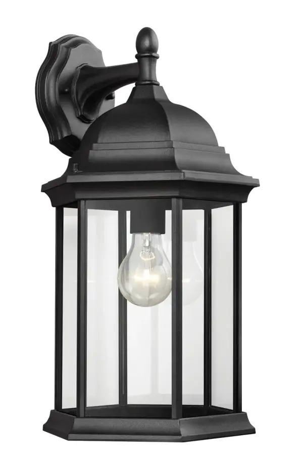 The Sevier Large Wall Lantern combines timeless design with practical downlight illumination. Its black finish and substantial size make it ideal for exterior entryways and covered outdoor spaces.
