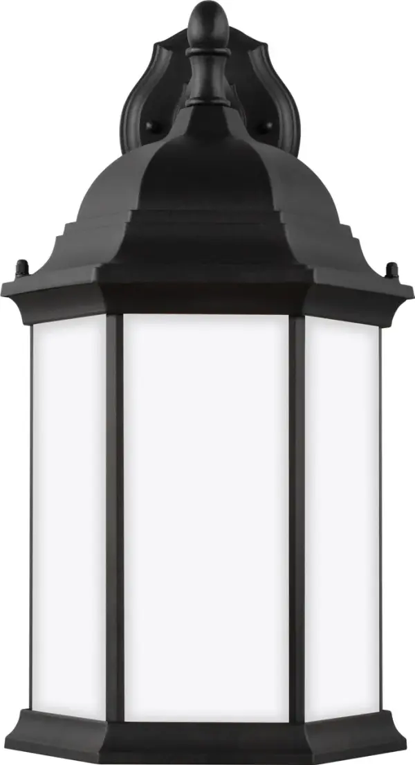The Sevier Large Wall Lantern combines traditional lantern styling with contemporary downlight functionality. Its black finish and clear glass panels create a versatile outdoor lighting solution.