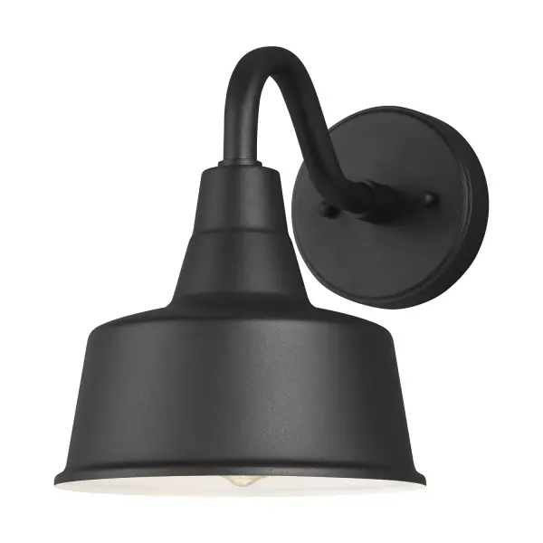 This handcrafted aluminum wall lantern delivers authentic barn-style charm with modern reliability. The wet-rated fixture provides ample downward light for entryways, garages, and patios while the included 6-inch extender allows customization.